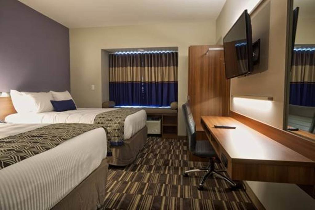 Microtel Inn & Suites Су Сент Мари Стая снимка