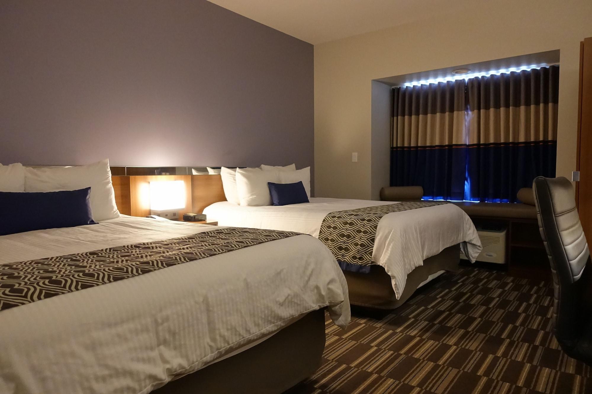 Microtel Inn & Suites Су Сент Мари Екстериор снимка