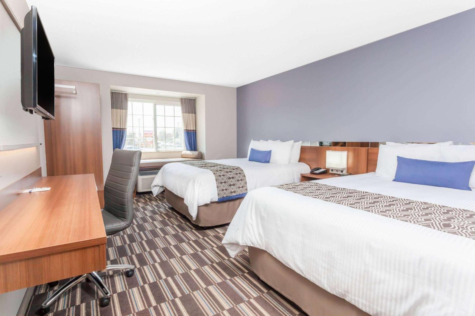 Microtel Inn & Suites Су Сент Мари Екстериор снимка